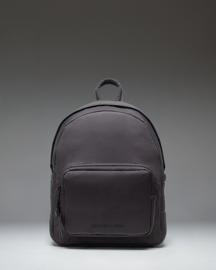 Herschel Supply Co. Cloudform Backpack in black, shown from the front, highlighting its clean design and durable construction.