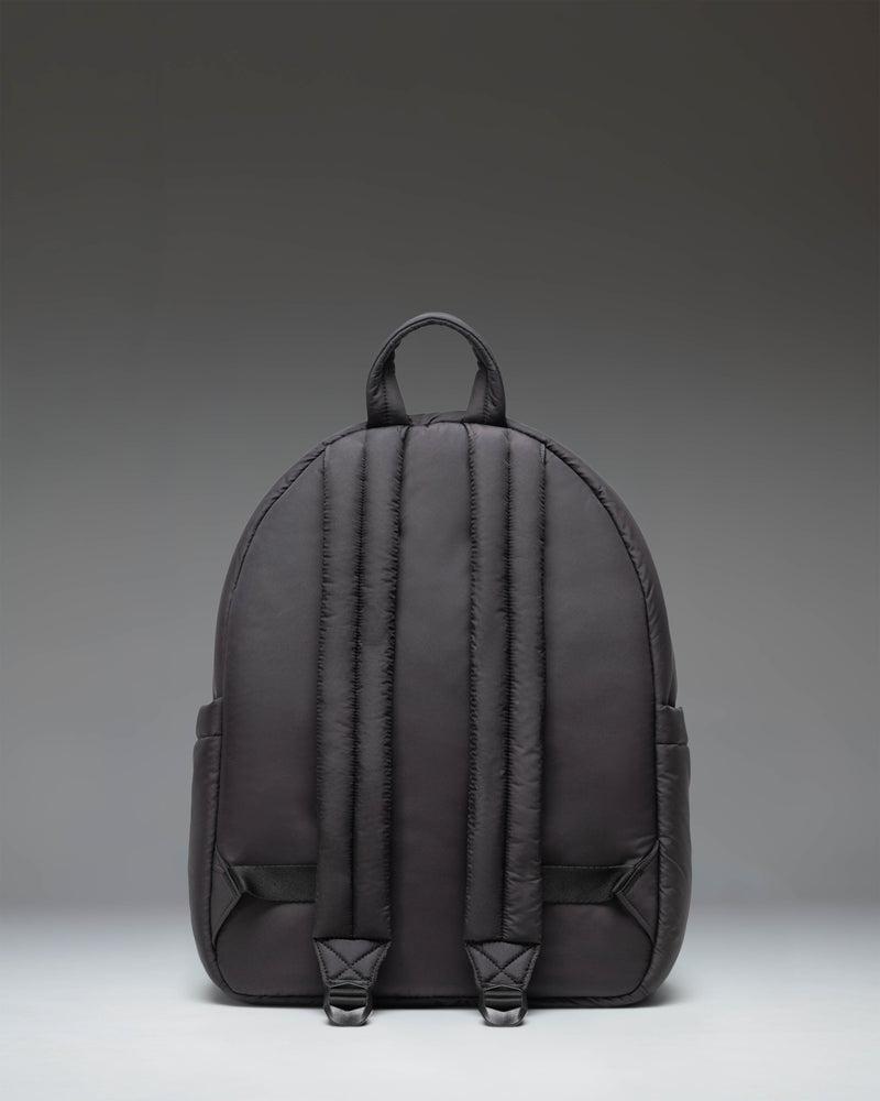 Herschel Supply Co. Cloudform Backpack in black, featuring a minimalist design with padded, lightweight fabric and adjustable shoulder straps.