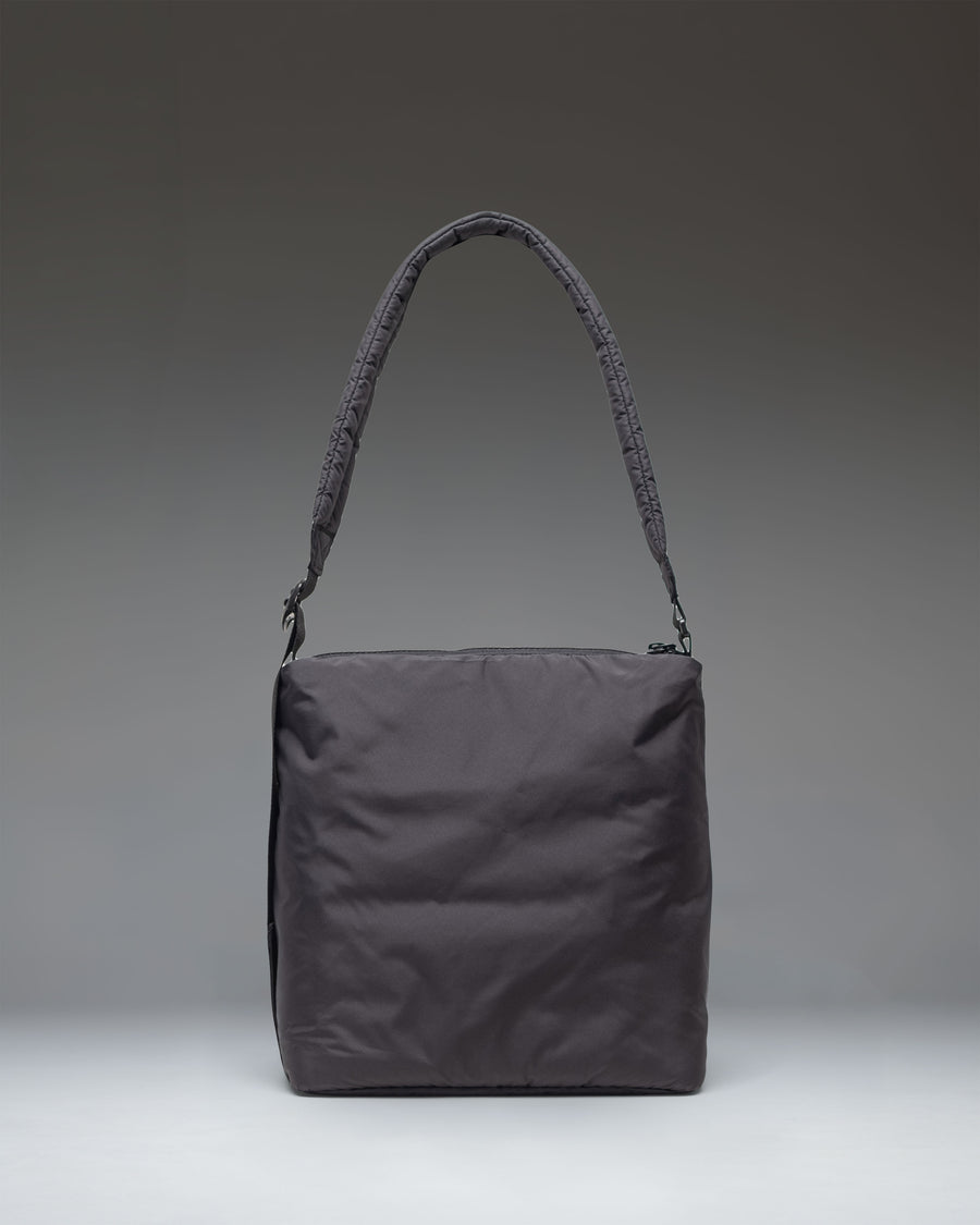 Herschel Supply Co. Cloudform Small Tote bag in sleek black, showcasing its compact design and durable material for everyday use.