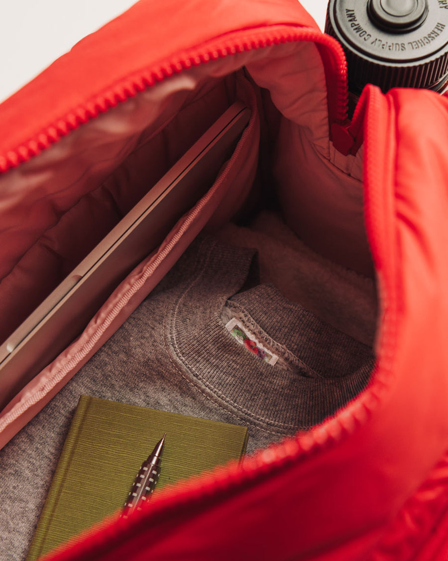 A product shot of the Herschel Supply Cloudform Duffle in Rose Violet.