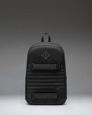 Herschel Supply Co. Fleet Skate Backpack in black, featuring an open front pocket with adjustable skate straps and a classic woven label.