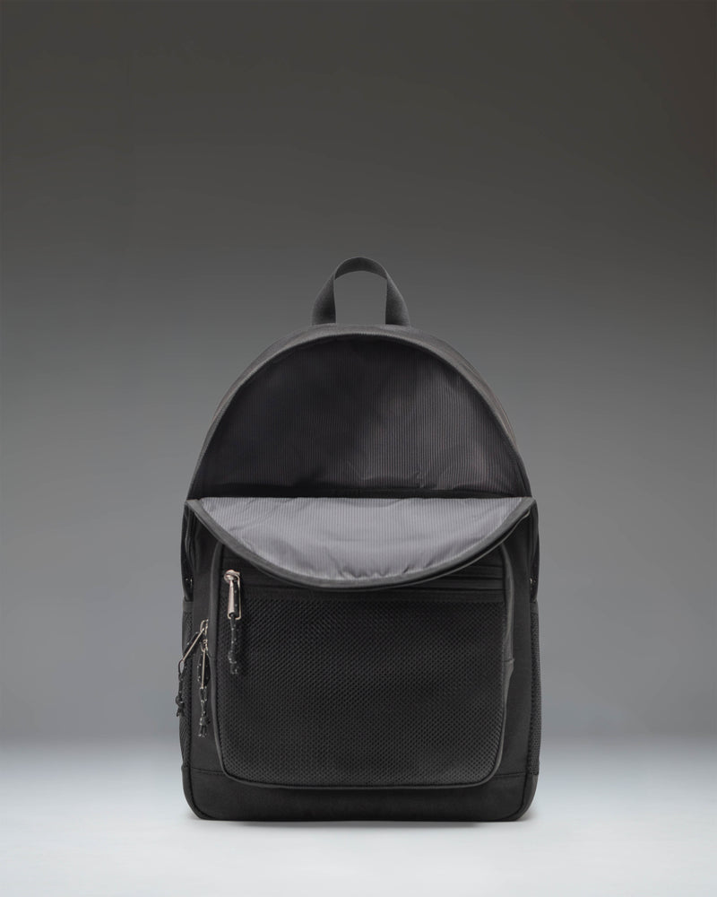 Herschel Supply Co. Kaine Backpack in solid black featuring dual water bottle pockets, a front storage pocket, and adjustable shoulder straps.