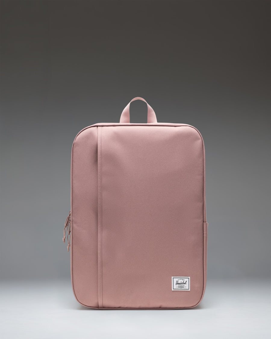 Herschel Supply Co. Wesbrook Backpack in Ash Rose, featuring a clean front view with zippered compartments and shoulder straps.