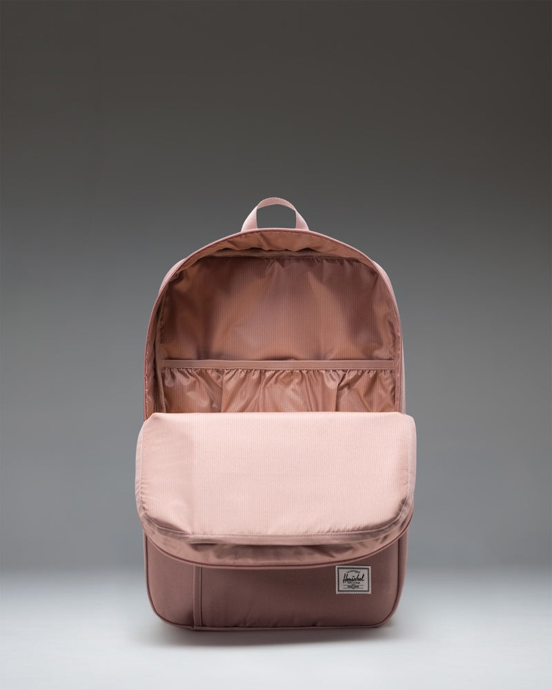Herschel Supply Co. Wesbrook Backpack in Ash Rose, an everyday commuter bag featuring a spacious main compartment and clean minimalist design.