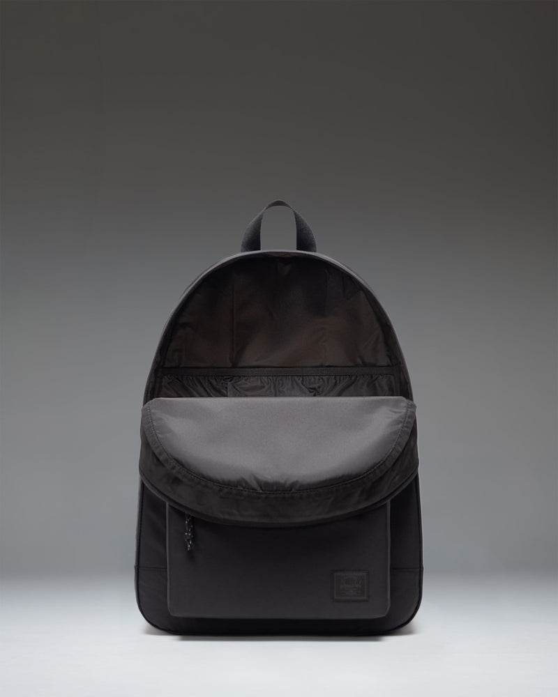 Herschel Supply Co. Herschel Classic XL Backpack in solid black, showcasing its spacious design and timeless style for everyday use.