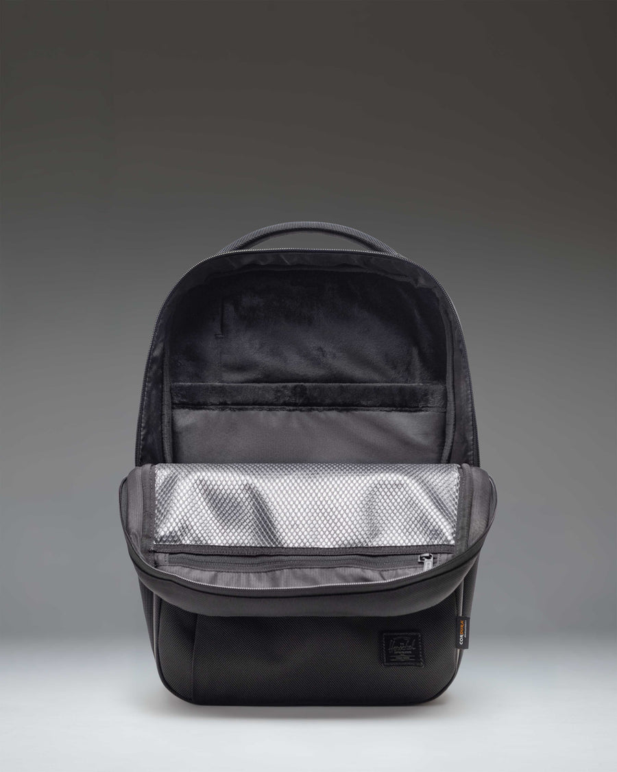 Herschel Supply Co. Kaslo Daypack Tech Cordura in black, featuring a clean, rectangular design with multiple compartments for tech storage.