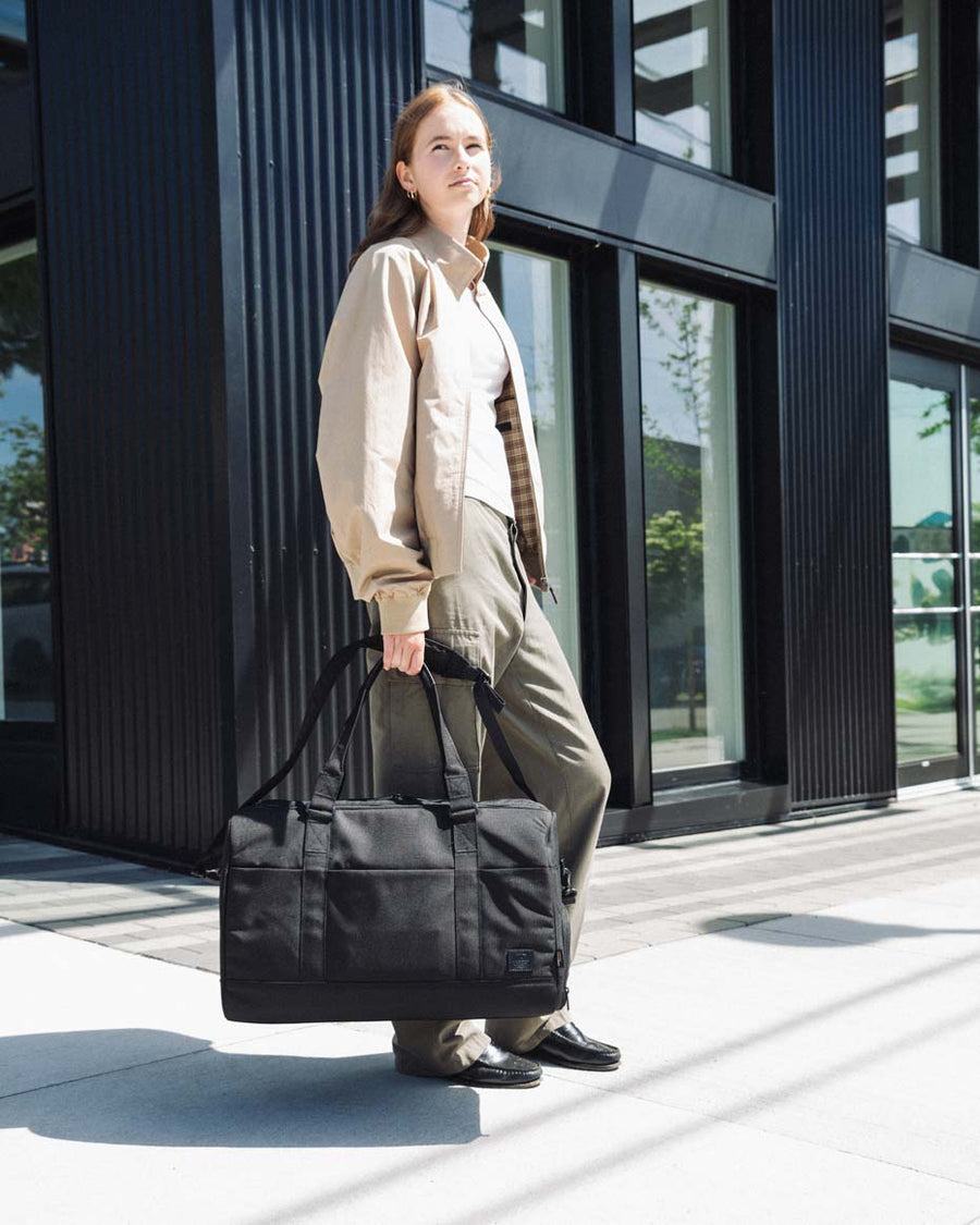 Herschel Novel Duffle Tech Cordura bags displayed together in a lineup to showcase all available color options.