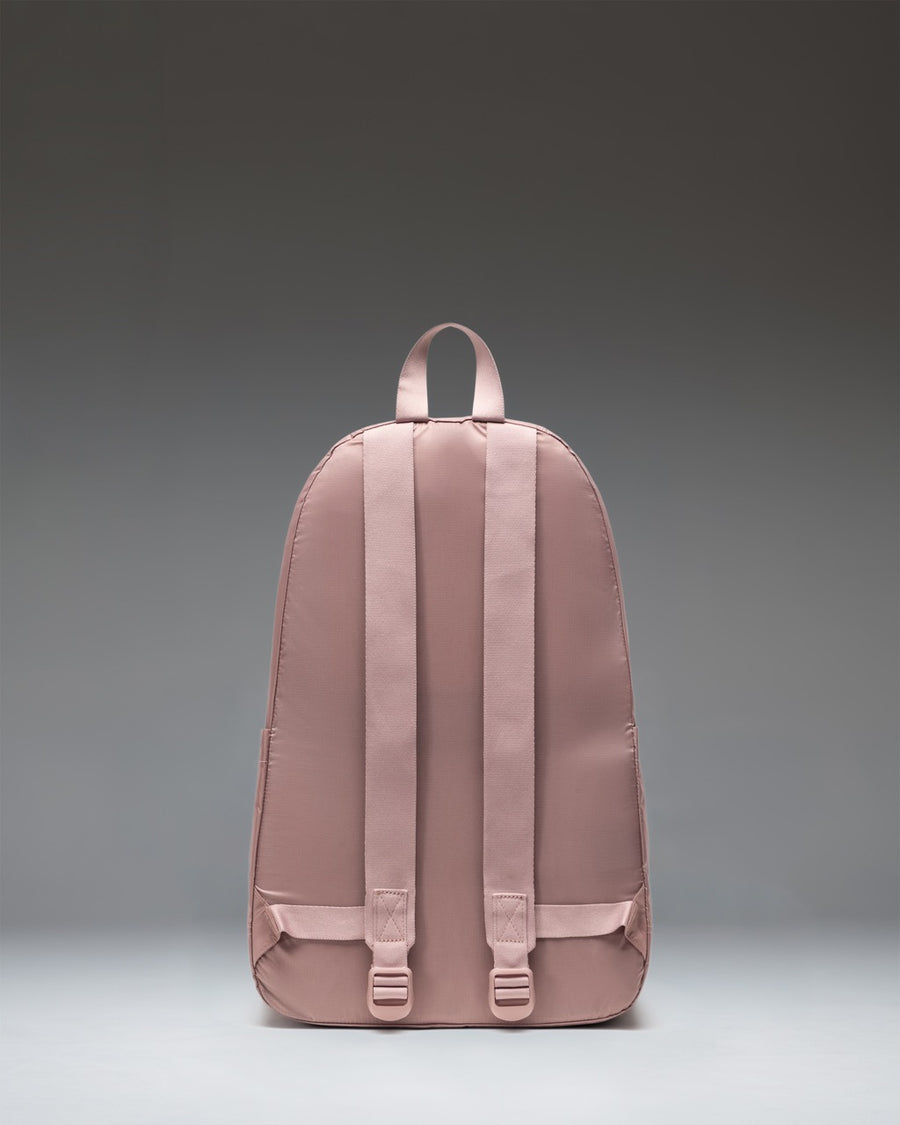 Herschel Supply Co. Rome Packable Backpack in Ash Rose Tonal showing its lightweight, foldable design.