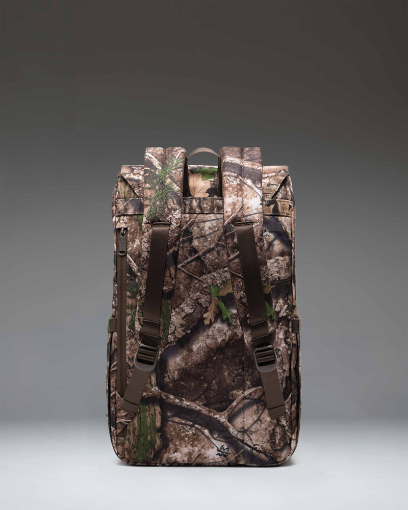 Herschel Supply Co. Realtree Retreat Backpack in Realtree APX Camo pattern, showing a detailed product view.