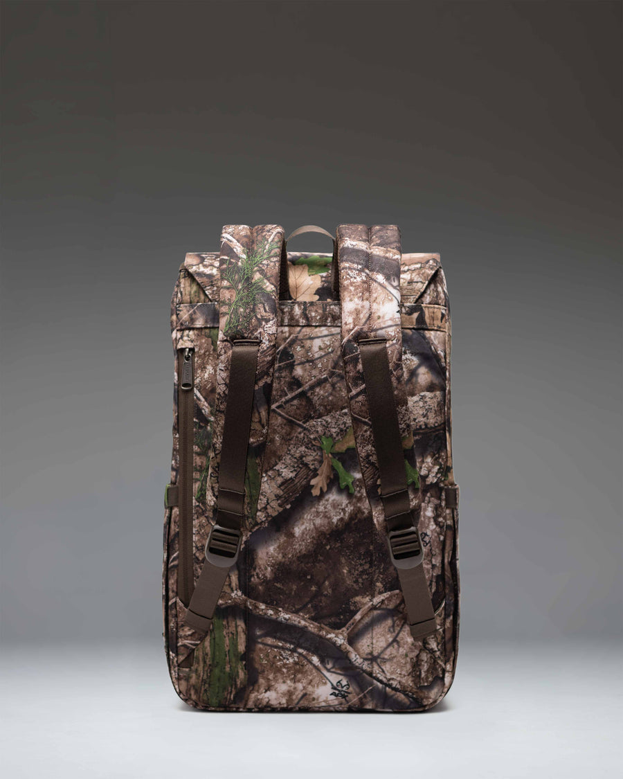 Herschel Supply Co. Realtree Retreat Backpack in Realtree APX Camo pattern, showing a detailed product view.