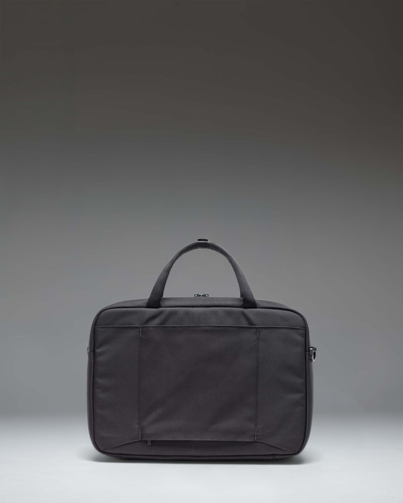 Herschel Supply Co. Gibson Messenger Tech Cordura in Black. Front view of the durable tech messenger bag with carrying handles.