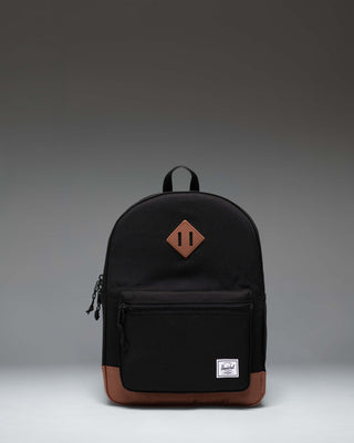 Herschel Heritage Kids Backpack in Black/Saddle Brown featuring a classic diamond accent and a convenient front pocket.
