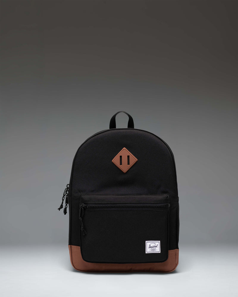 Herschel Heritage Kids Backpack in Black/Saddle Brown featuring a classic diamond accent and a convenient front pocket.