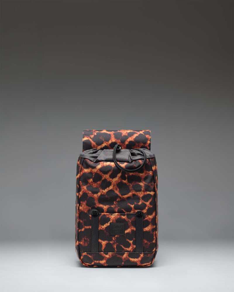 Herschel Retreat Mini Backpack in Digi Leopard print, showcasing its compact design and classic strap details.