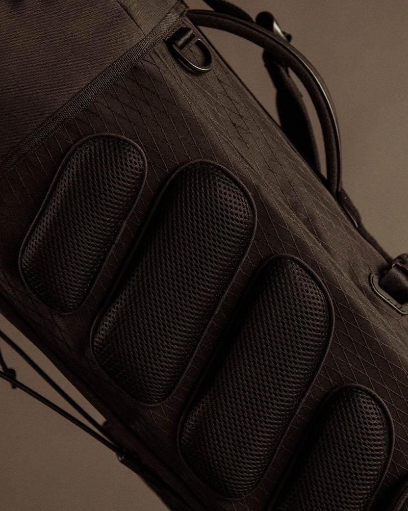 Herschel Watt Light Stand Golf Bag shown from multiple angles in black, navy, and woodland camo colorways.