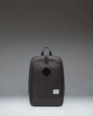 Black Herschel Heritage Shoe Bag showing the front view with a handle and the classic Herschel woven label.