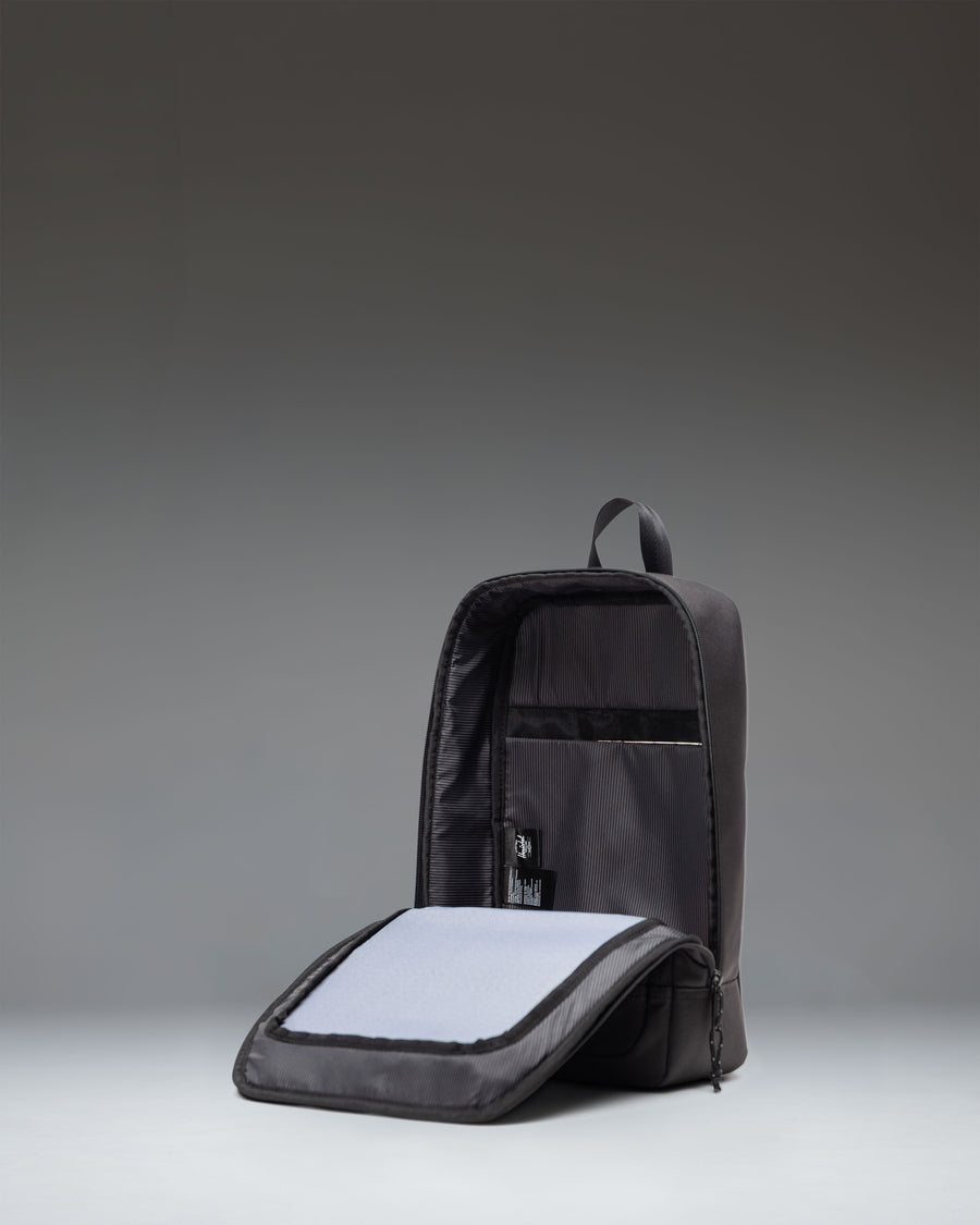 Herschel Heritage Shoe Bag in black, featuring a convenient carry handle, zippered main compartment, and signature classic woven label.