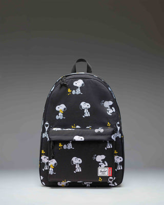 Herschel Supply Co. Peanuts Classic XL Backpack in Snoopy and Woodstock Black featuring a repeating pattern of the classic comic characters.