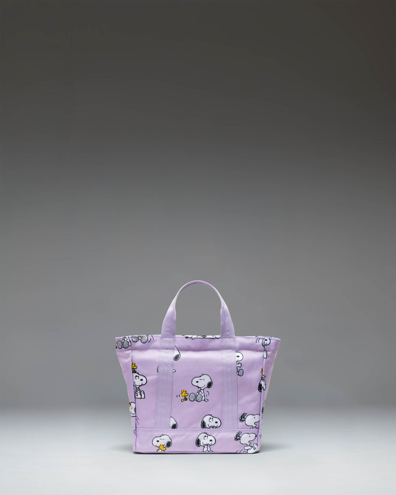 Herschel Supply Co. Peanuts Herschel Heritage Small Tote in Snoopy and Woodstock Pastel Lilac showing its storage space.