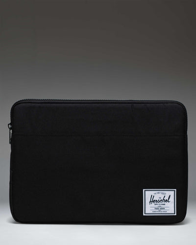 Herschel Supply Co. Anchor 15-16 Inch laptop sleeve in solid black, showing the clean front design.
