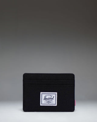 Herschel Supply Co. Charlie Cardholder wallet in solid black featuring multiple card slots and the signature woven label.