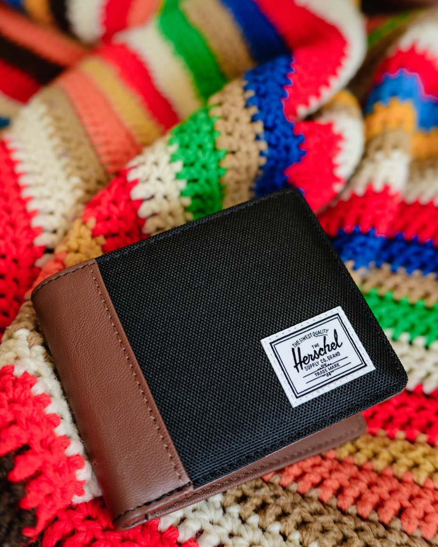Herschel Supply Co. Hank Wallet displayed in a variety of available colors.