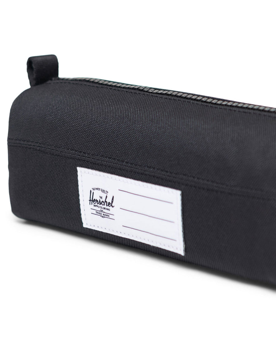 Little Herschel Settlement Pencil Case size guide chart showing dimensions: 2.75 inches height, 8 inches width, and 2.5 inches depth.