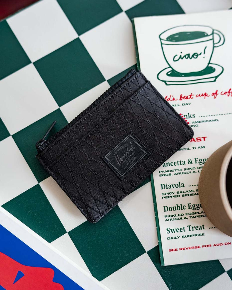 Herschel Supply Co Oscar Cardholder displayed in multiple color options.