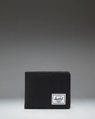 Black Herschel Supply Co. Roy Coin Wallet bi-fold design showing the clean front exterior with the classic woven label.