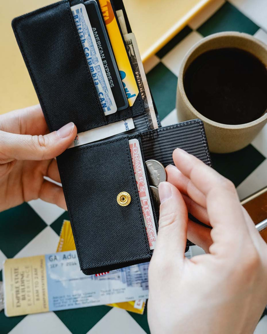 Herschel Roy Coin Wallet in all colors grid showing multiple colorways.