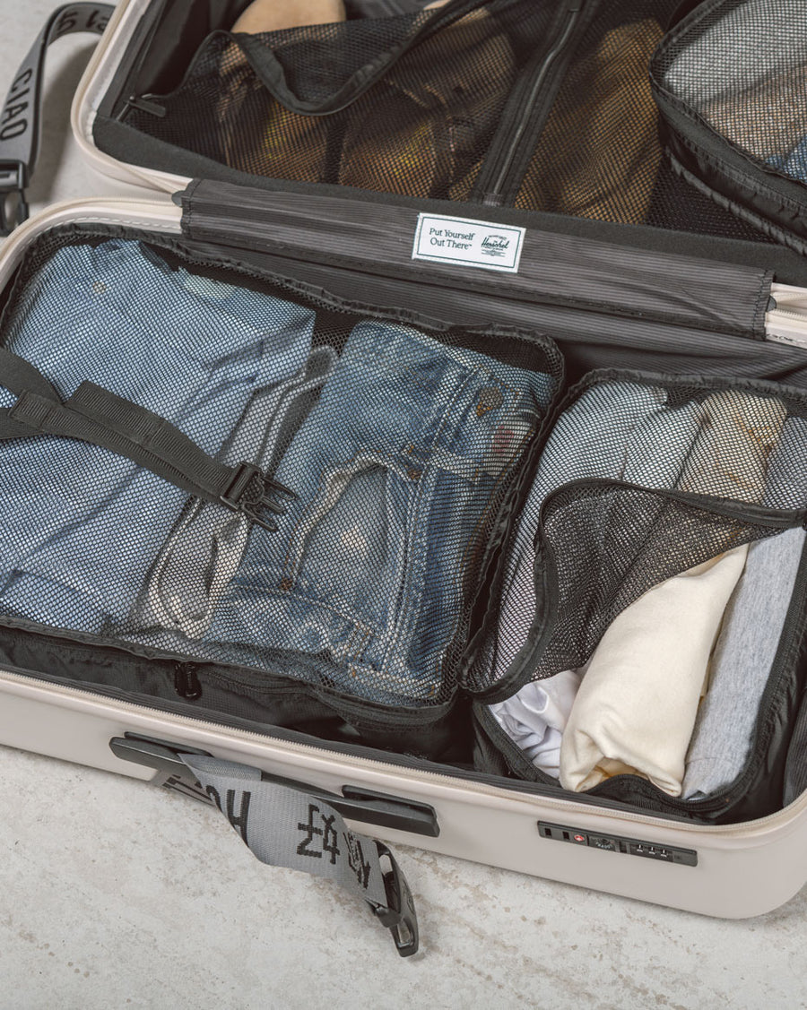 Herschel Supply Co. Kyoto Packing Cubes shown in a variety of available colors.