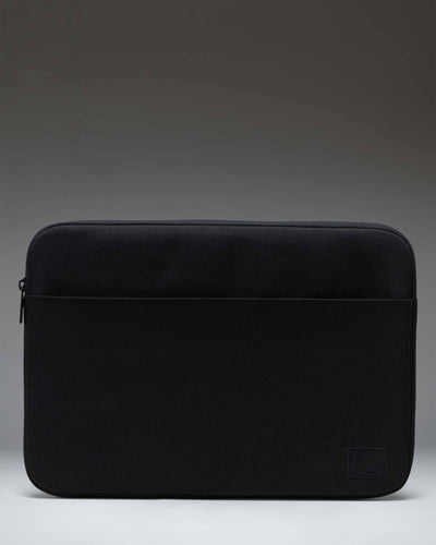 Herschel Supply Co. Denman 15-16 Inch Sleeve Tech in black, showing the sleek, minimalist laptop case design.