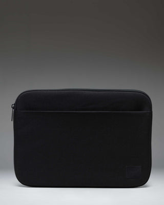 Black Herschel Supply Co. Denman 14-inch tech sleeve shown from the front against a white background.