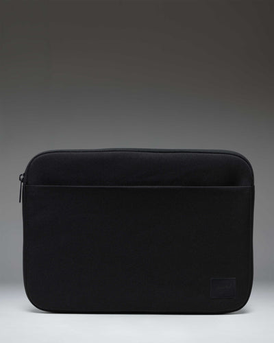 Black Herschel Supply Co. Denman 14-inch tech sleeve shown from the front against a white background.