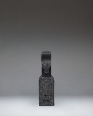 Herschel Supply Co. black vegan leather luggage tag.