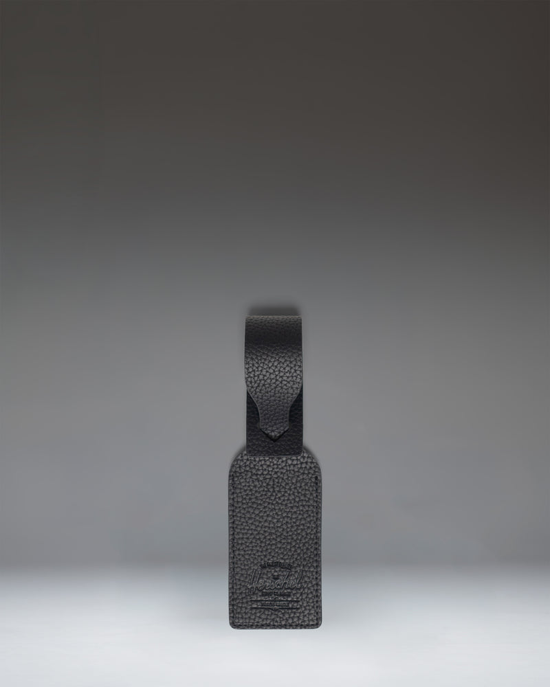 Herschel Supply Co. black vegan leather luggage tag.