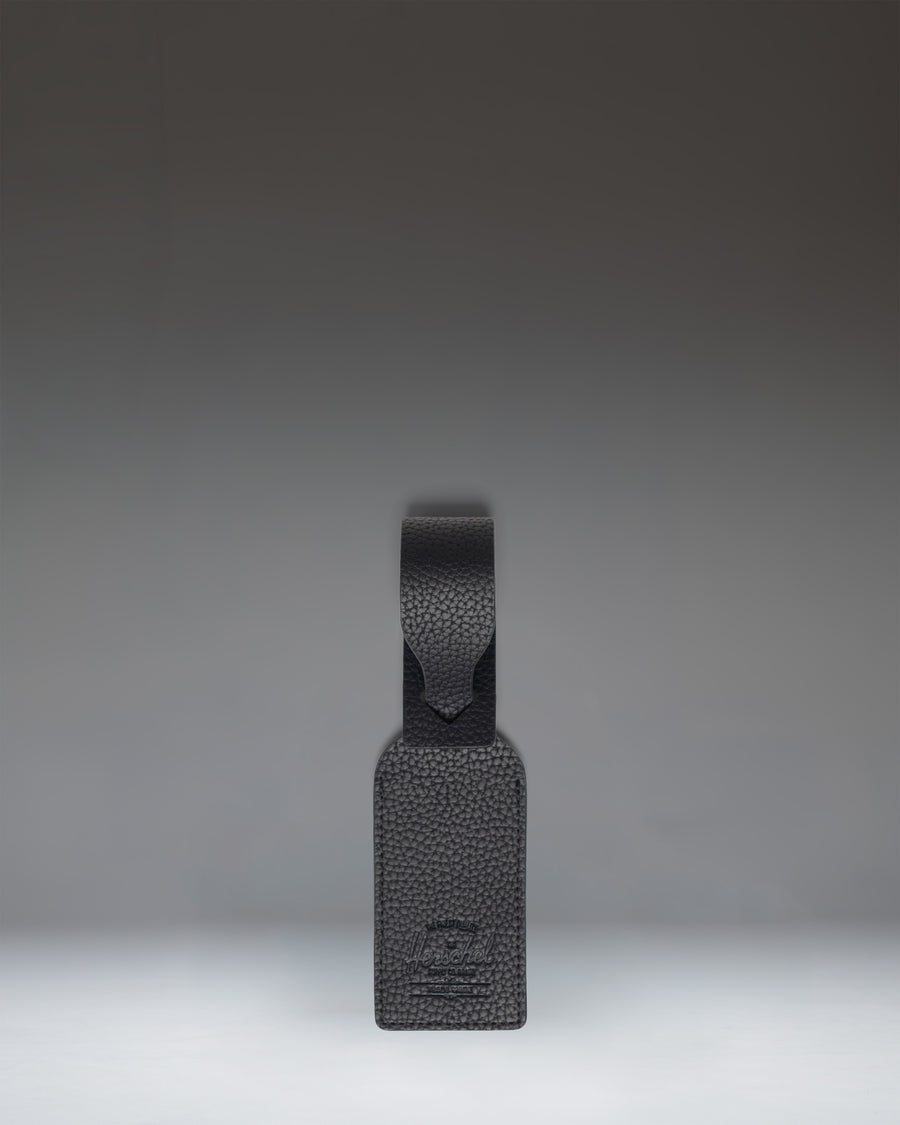 Herschel Supply Co. black vegan leather luggage tag.