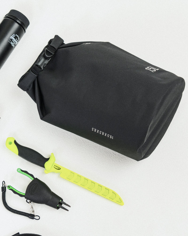 Herschel Supply Co. Dry Bag Organizer 15L waterproof bag with a roll-top closure, welded seams, and a clip buckle.