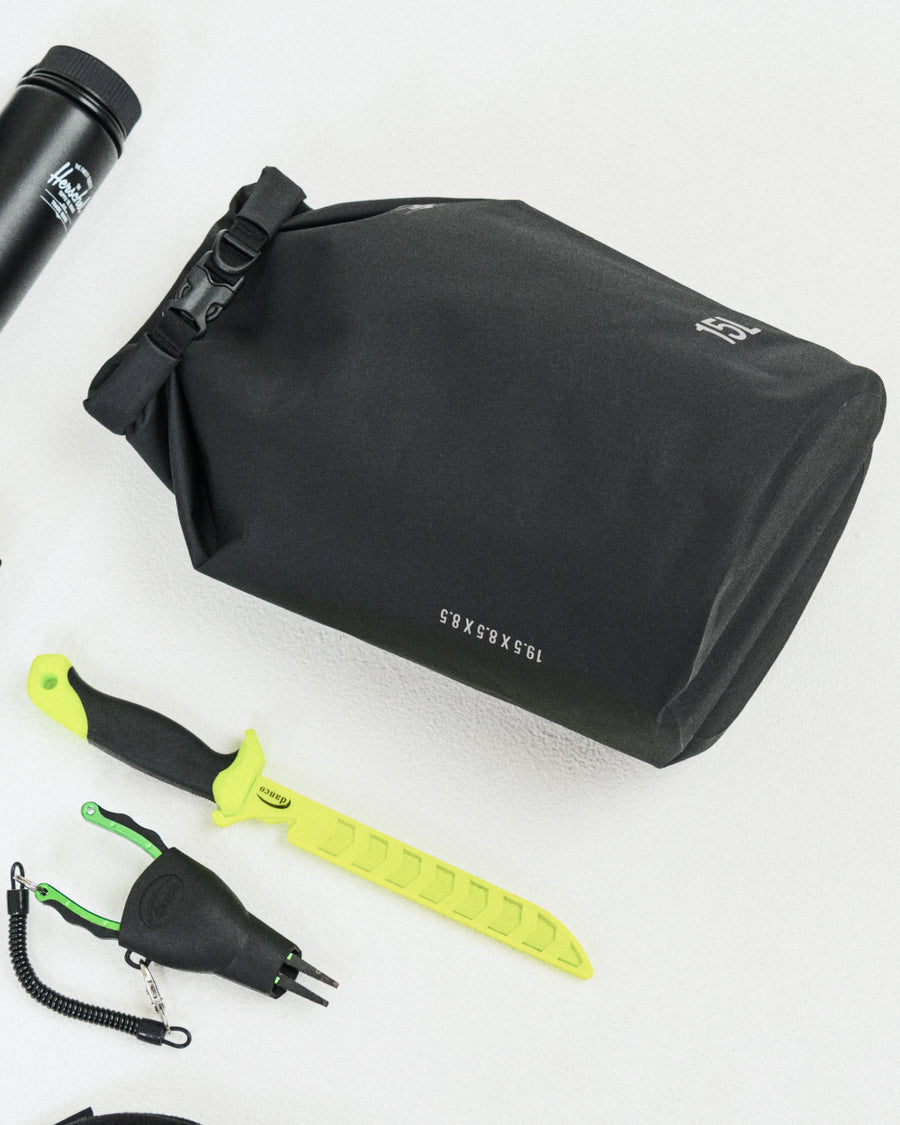 Herschel Supply Co. Dry Bag Organizer 15L waterproof bag with a roll-top closure, welded seams, and a clip buckle.
