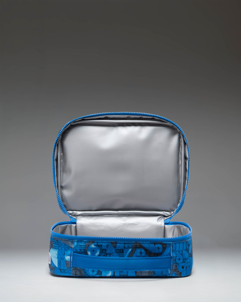 Herschel Supply Co LEGO Pop Quiz Lunch Box in Abstract Bricks Blue pattern.