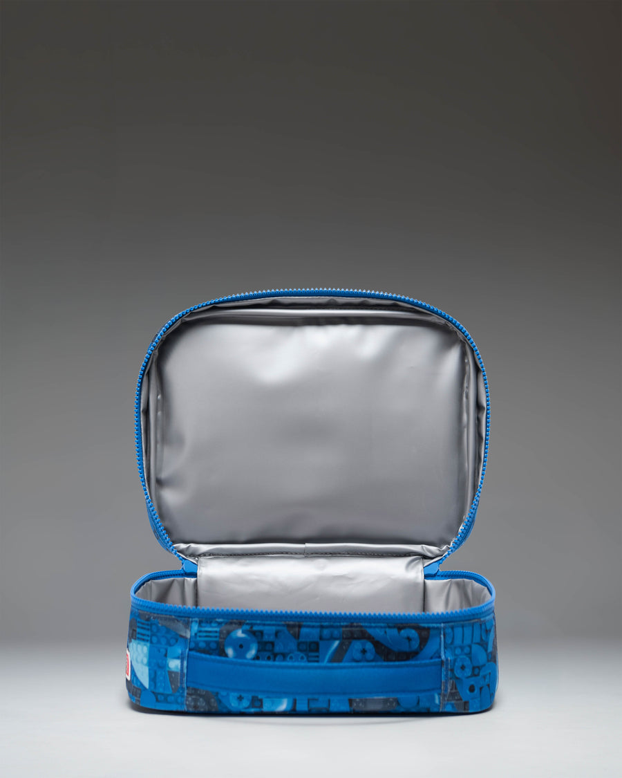 Herschel Supply Co LEGO Pop Quiz Lunch Box in Abstract Bricks Blue pattern.