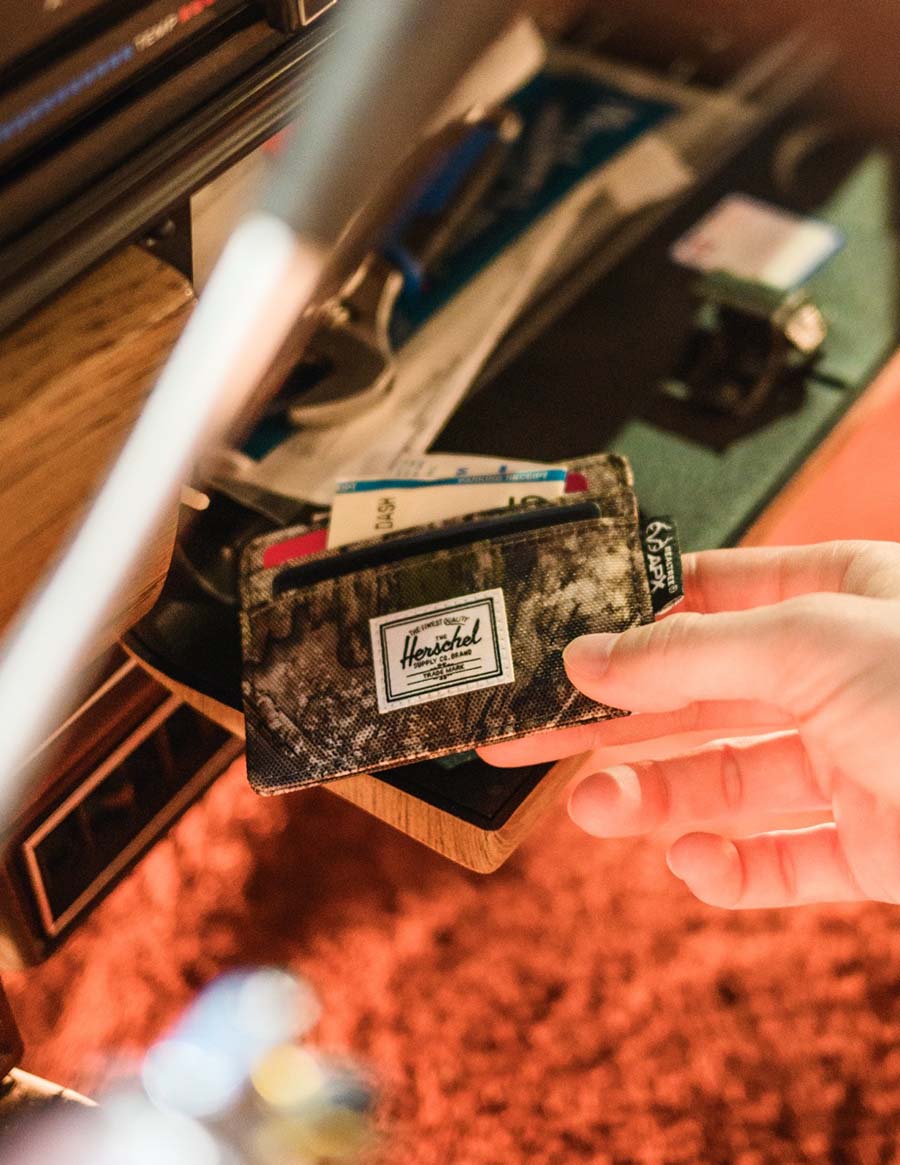 Herschel Supply Co. Charlie Cardholder displayed in multiple colors and camouflage patterns.