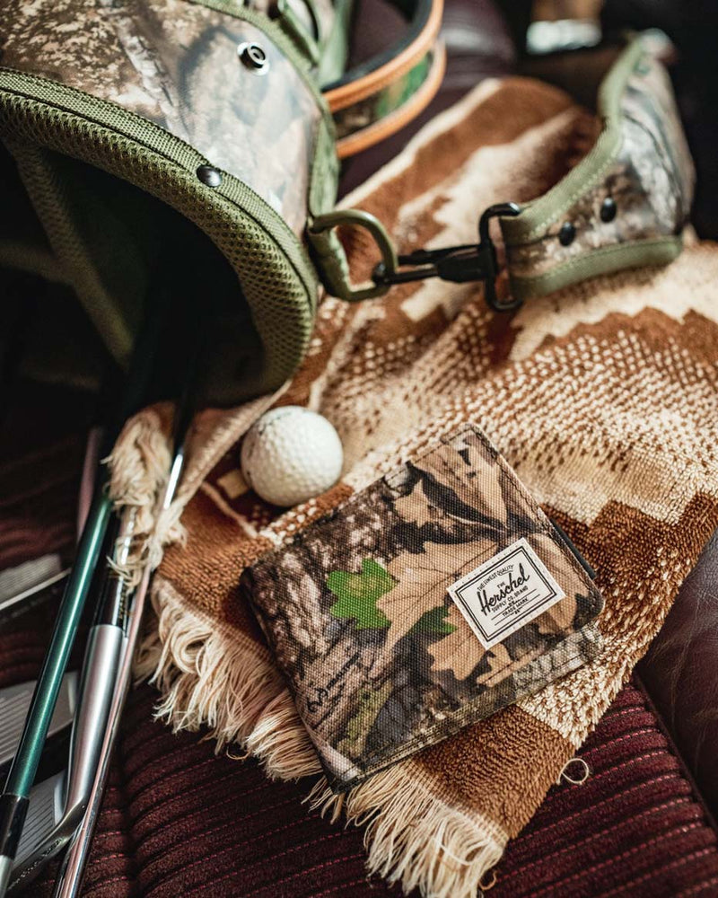 Herschel Supply Co. Realtree Roy Wallet in Realtree APX Camo bifold design.