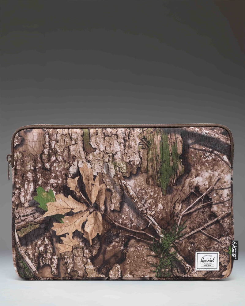 Herschel Supply Co. Realtree Anchor 15-16 Inch Sleeve in Realtree APX Camo.