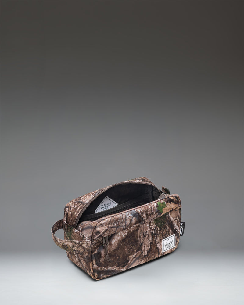 Herschel Supply Co. Chapter Travel Kit in Realtree APX Camo.