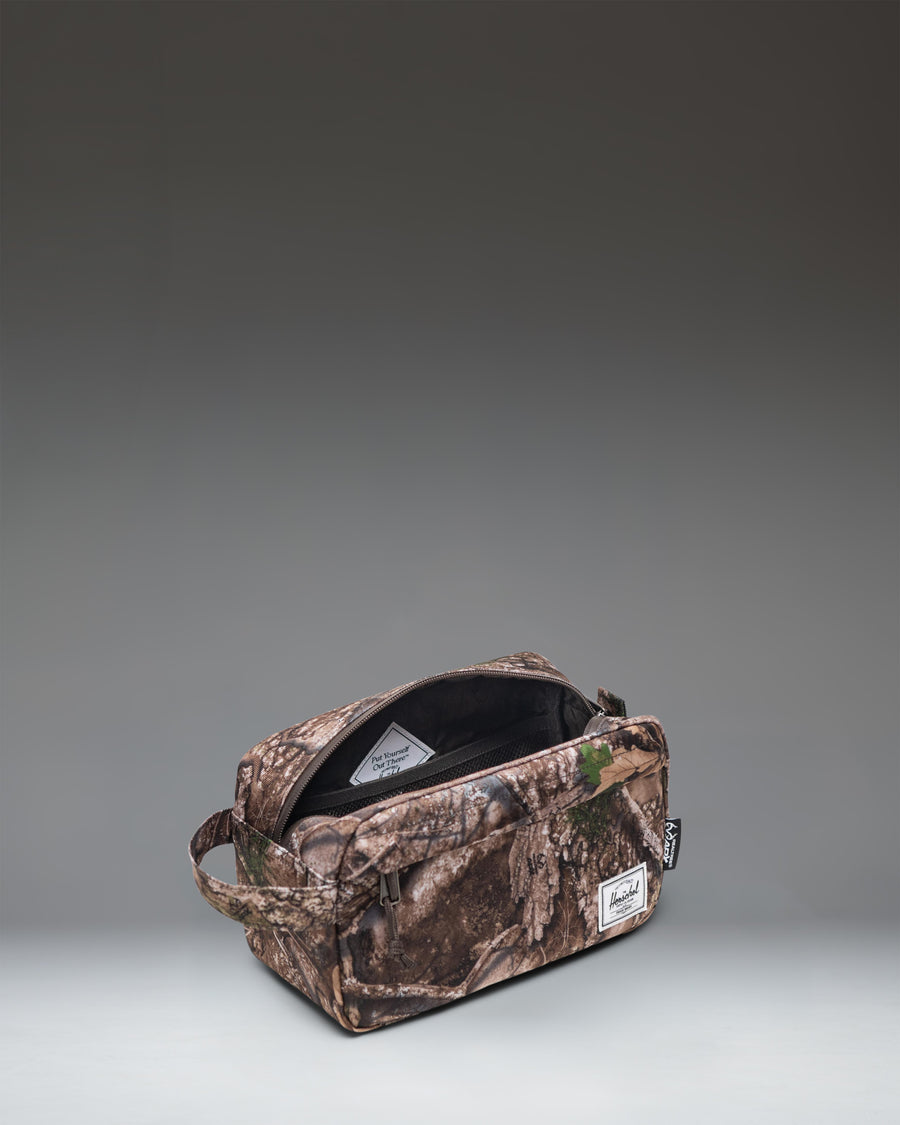 Herschel Supply Co. Chapter Travel Kit in Realtree APX Camo.