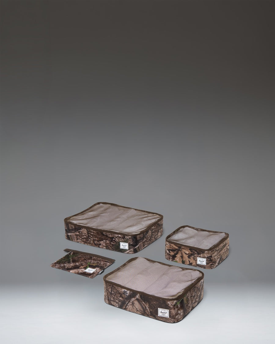 Herschel Supply Co. Realtree Kyoto Packing Cubes in Realtree APX Camo pattern.