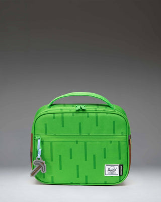 Herschel Supply Co. Minecraft Pop Quiz Lunch Box in The Overworld print, featuring a pixelated green and blue terrain design.