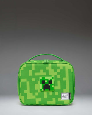Minecraft Pop Quiz Lunch Box Little Herschel in green Creeper pattern featuring the iconic blocky pixel design from the game.