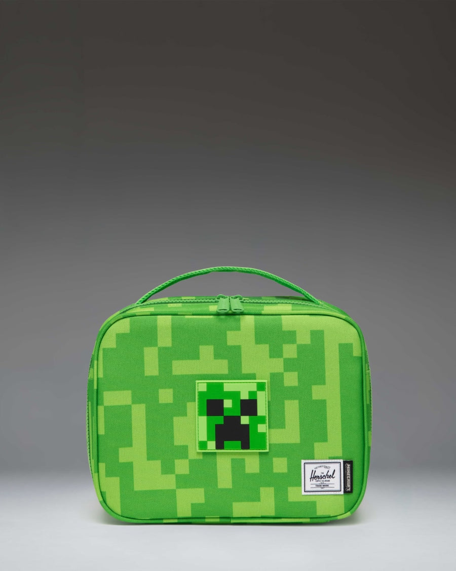 Minecraft Pop Quiz Lunch Box Little Herschel in green Creeper pattern featuring the iconic blocky pixel design from the game.